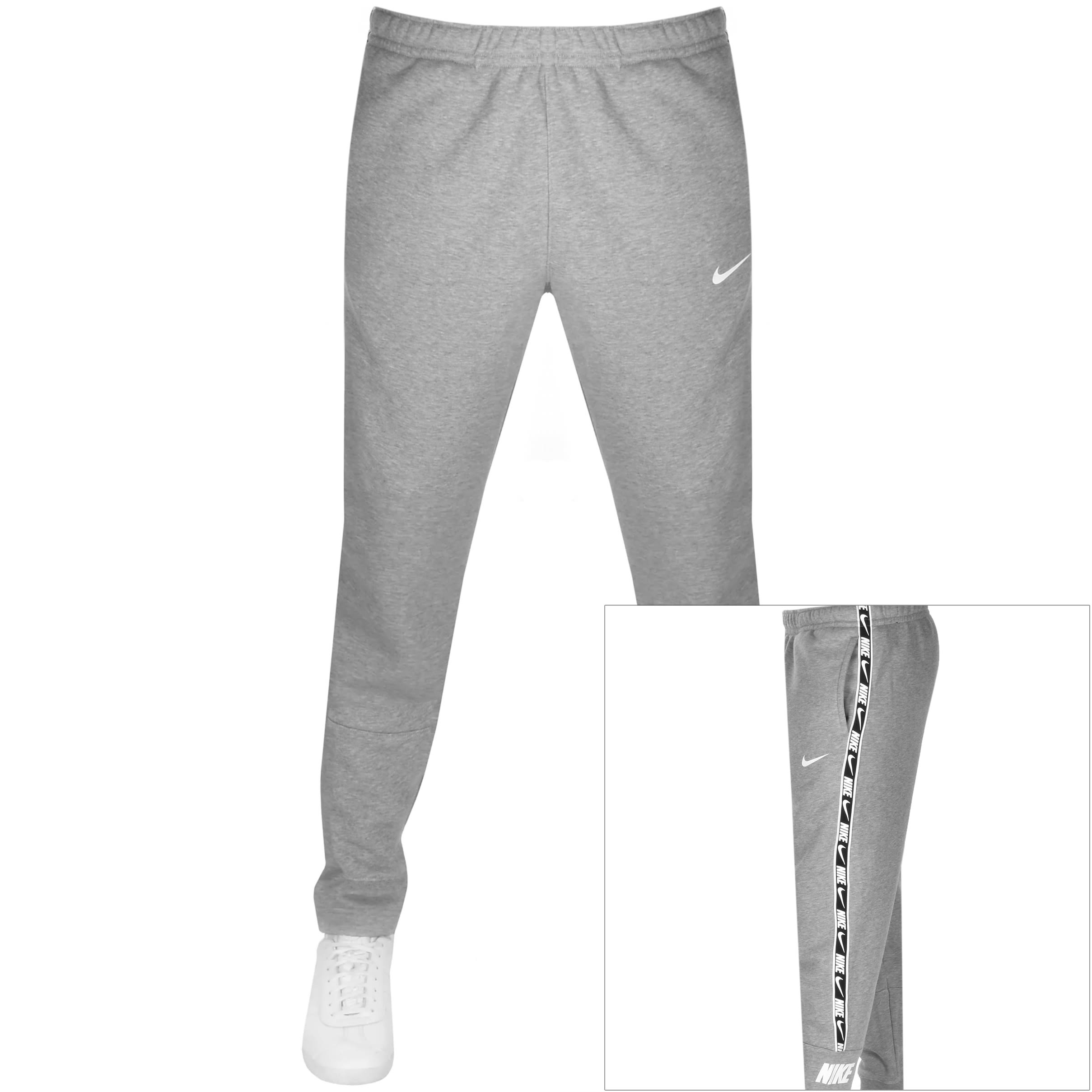 Alternative Image for ProductNike Repeat Logo Taped Jogging Bottoms Grey1